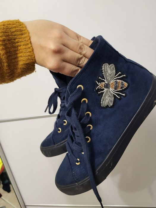 Teniși  imblaniti  unicati