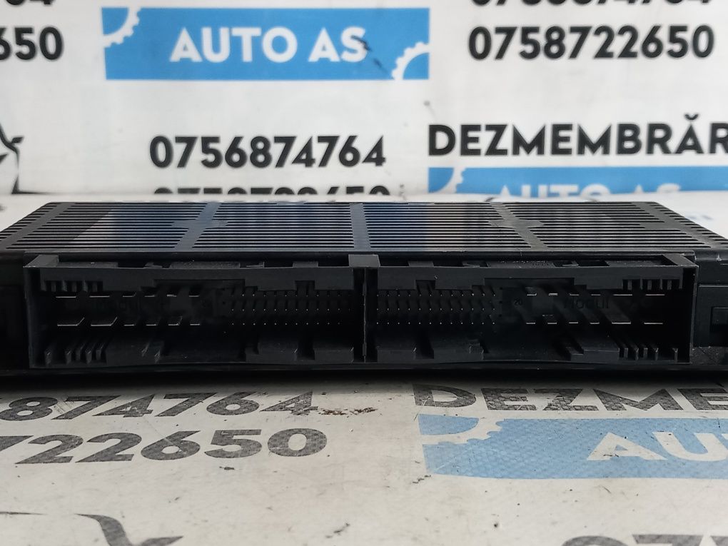 Calculator modul control lumini BMW e87 Seria 1