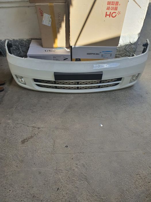 Kia Bongo передний бампер сборе с усилителам.  Туманникам