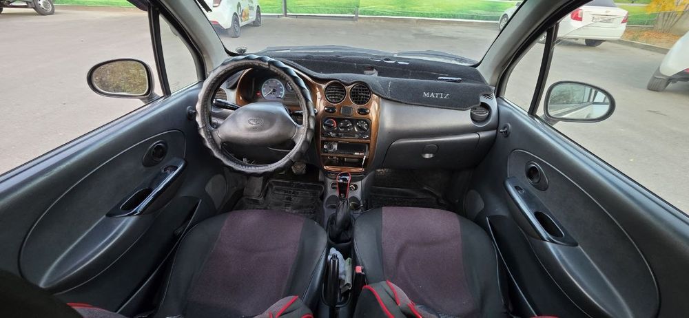 Матиз с метан газом и с кондиционером.