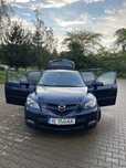 Mazda 3 1.6 MZR Sport Exclusive.