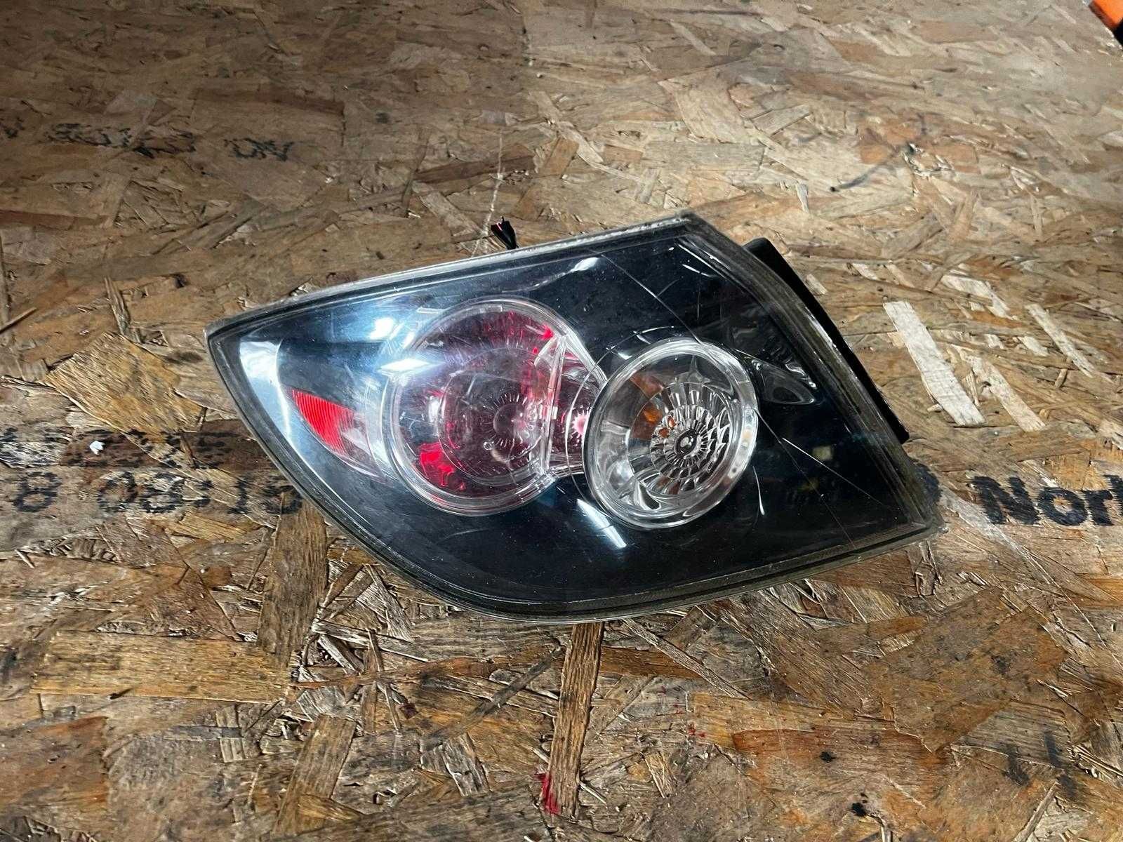 lampa stop mazda 3 hatchback stanga aripa an 2004