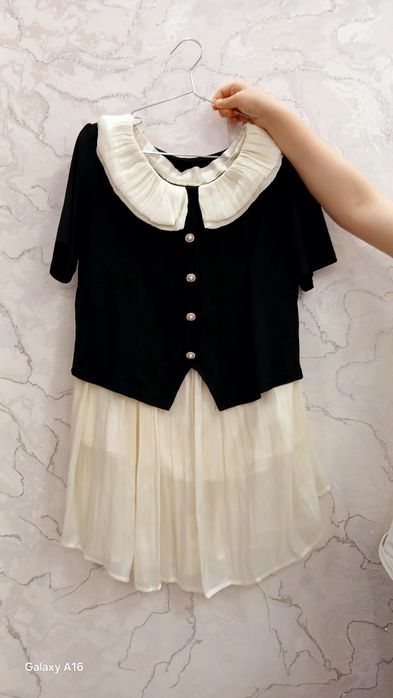 Yubka-kofta sotiladi. Holati yangi. Kiyganilada asal turadi.