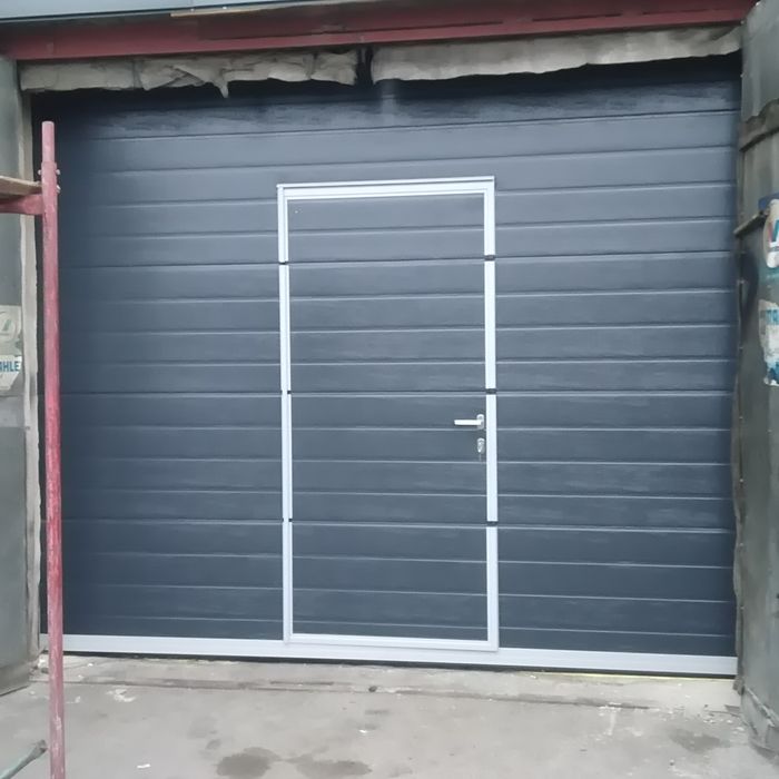 Ремонт и продажа секционных ворот и рольставни шлагбаумов и маркиз