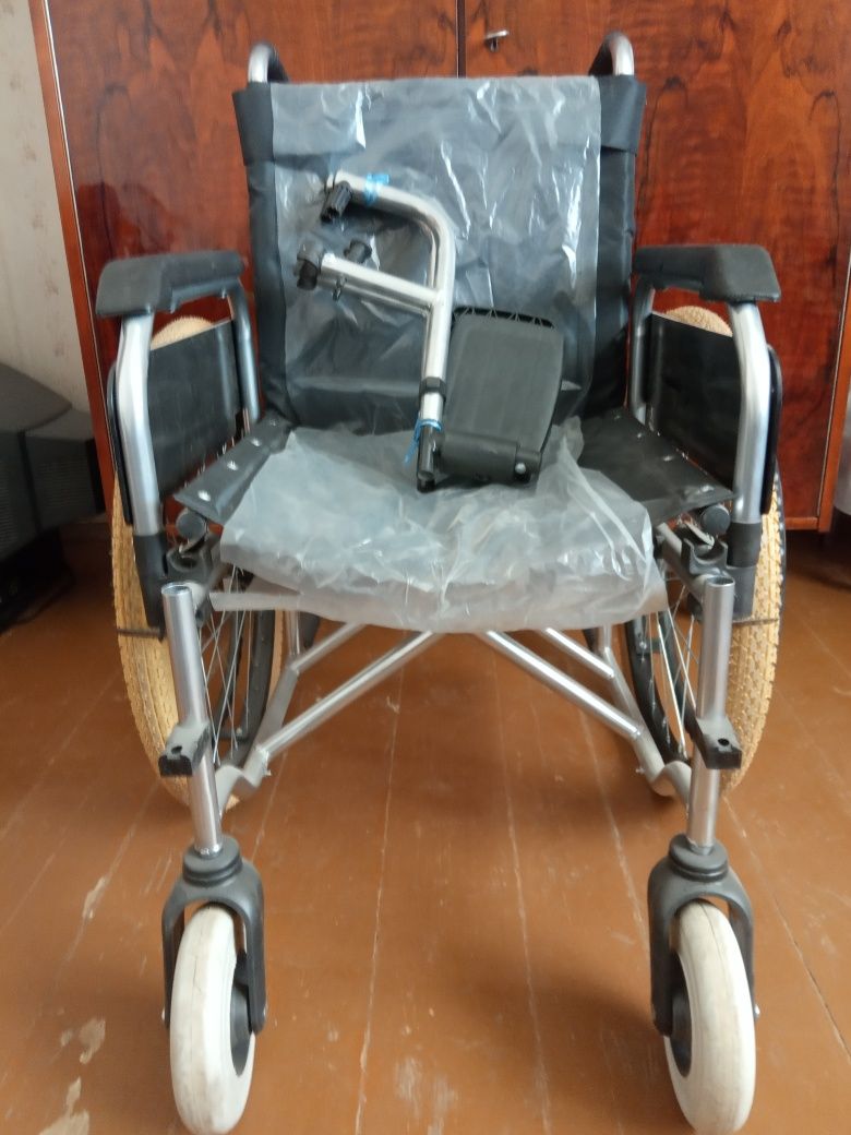 Инвалидная кресло.