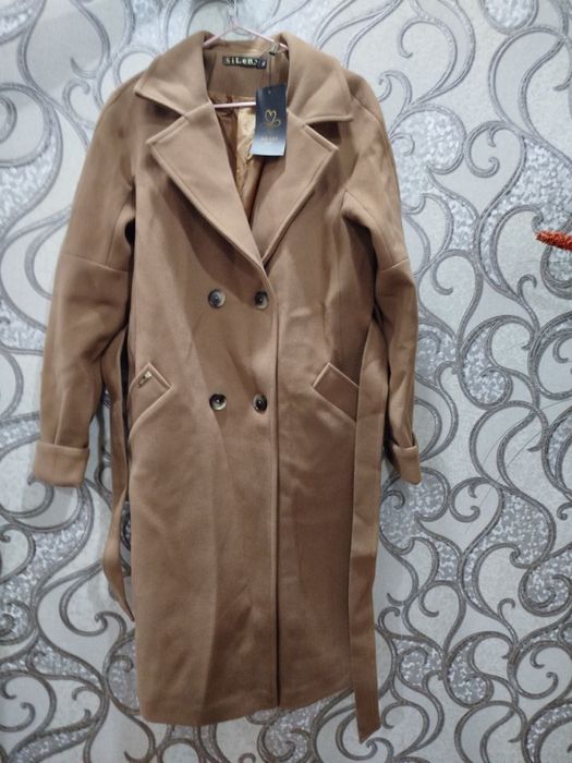 Женское польто……..