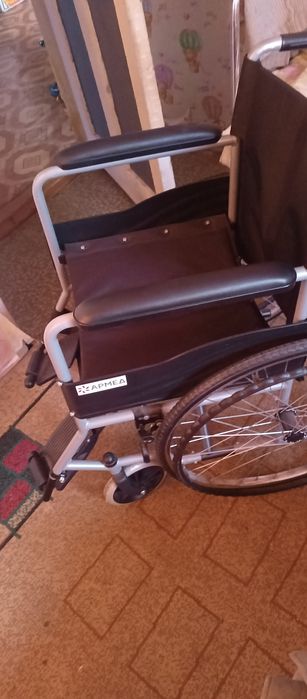 Инвалидная коляска новая