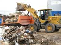 Вывоз строительного мусора с  территории
