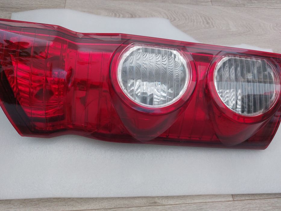 Продам задняя левую фара на JAG Sunray