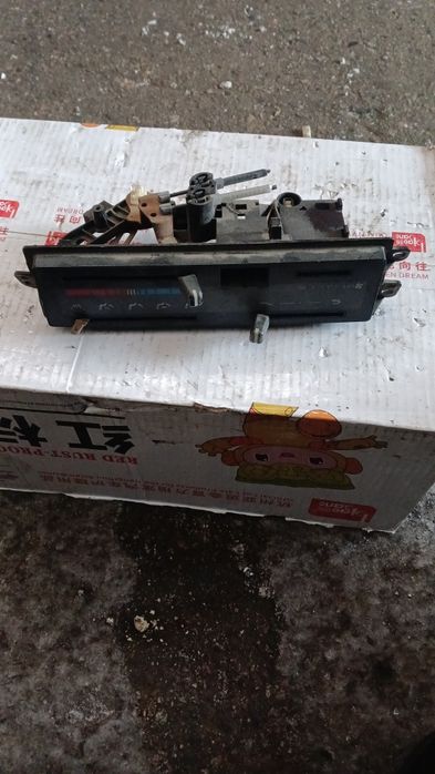 Включатель печки Мазда 323