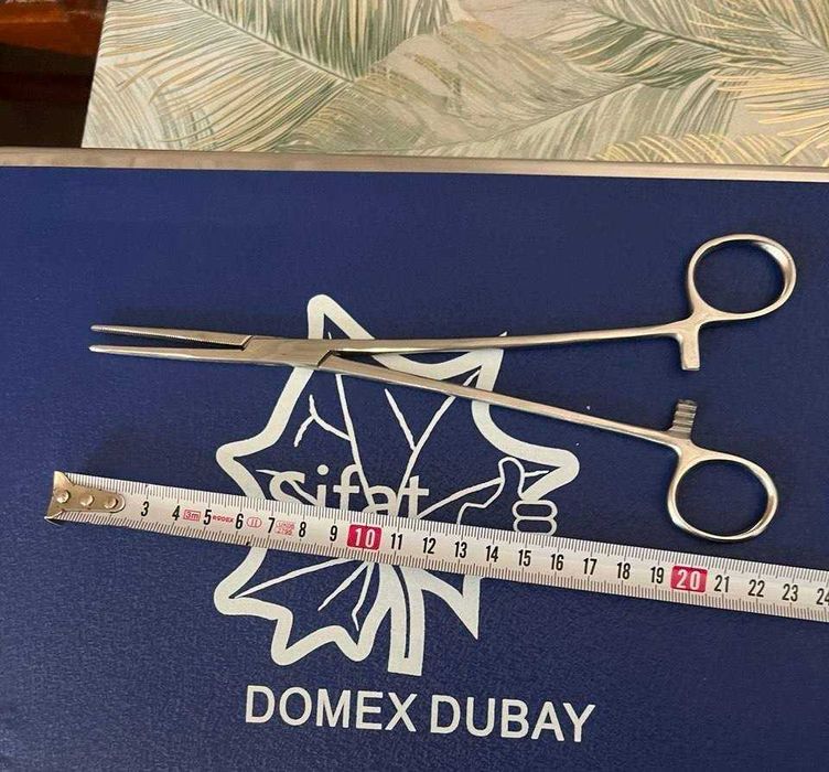 Гинекологический зажим / ножницы