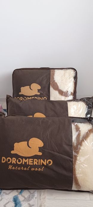 Подушки и плед Doromerino