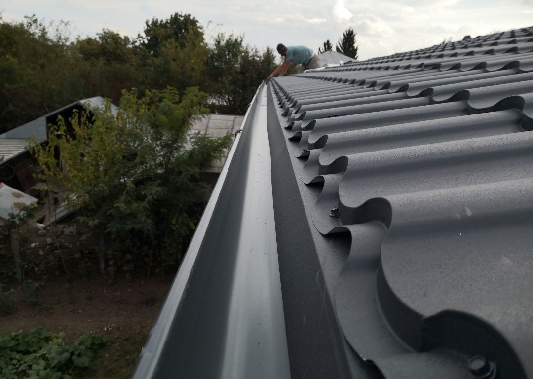 Montaj acoperis velux tigla metalica bilka velux jgheaburi