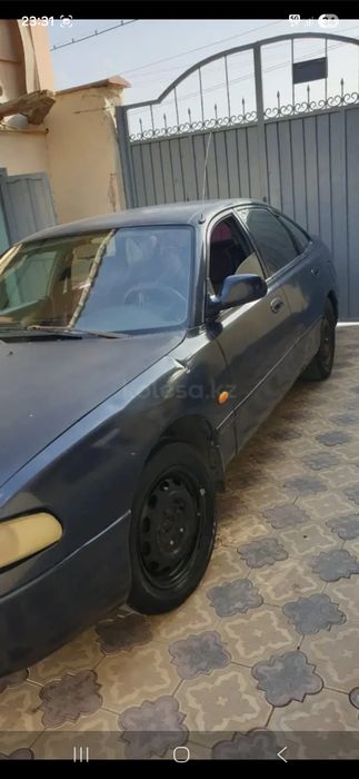 Мазда 626. 1.8 куб газ-бензин