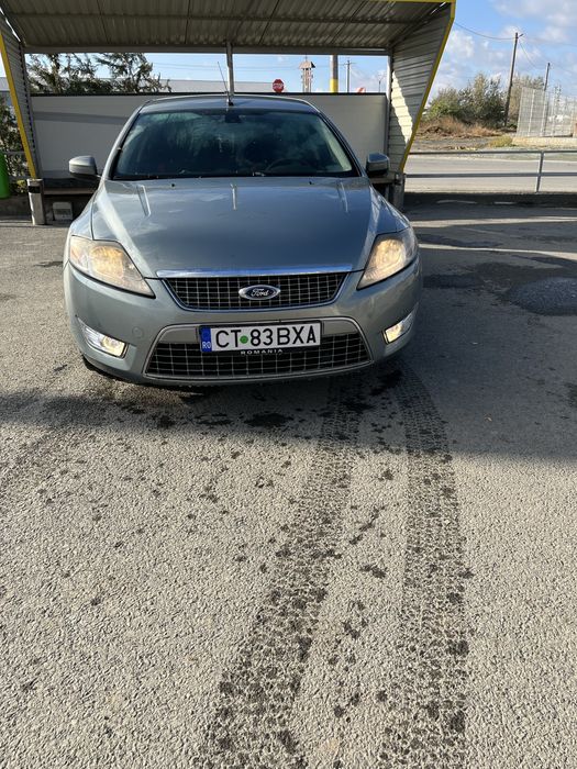 Vand   Ford Mondeo( sau fac schimb cu masina automata)