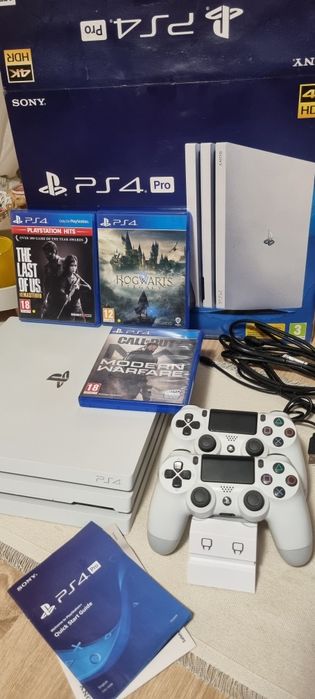Playstation 4 Pro 1TB + 2 джойстика + Станция за зареждане + 3 игри