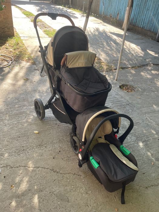 Carucior bebe trei în unul