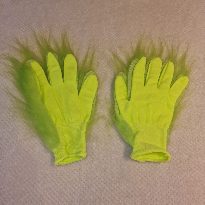 Manusi Grinch imblanite