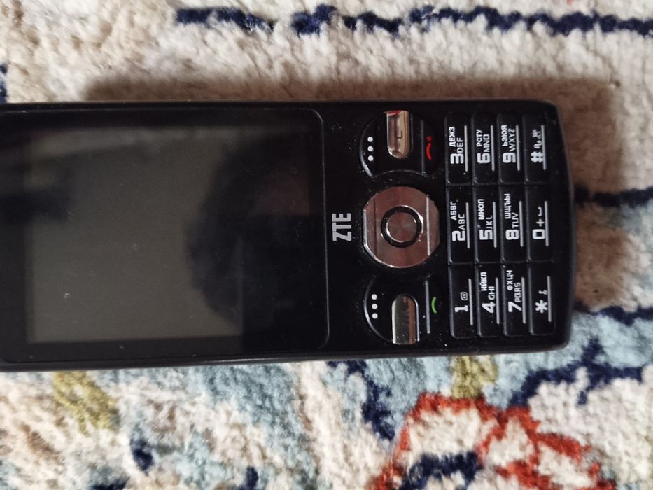 Кнопочный телефон