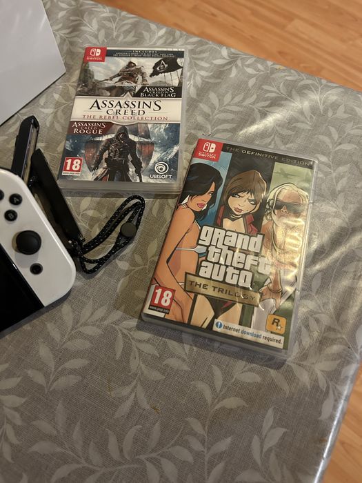 Nintendo switch oled с две игри