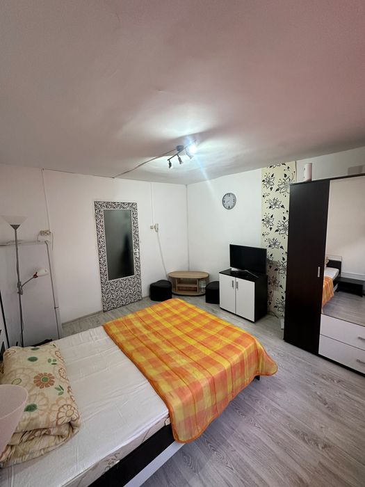 Garsoniera  mobilată vinde/inchiriaza