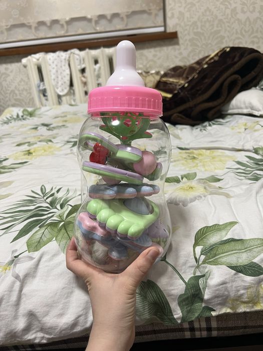 Игрушка . Пеленка , детская одежда .