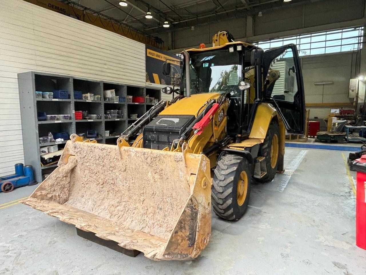 Экскаватор погрузчик Cat 428