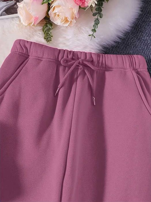 Дамски спортен панталон в тъмно розов цвят