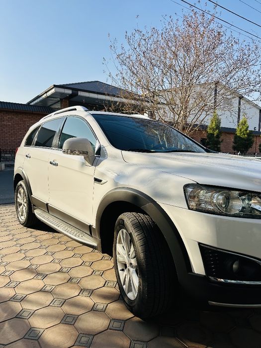 Каптива 2013 белый