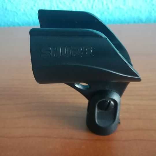 Suport nuca clema SHURE pentru microfon , realizat din ABS rezistent.