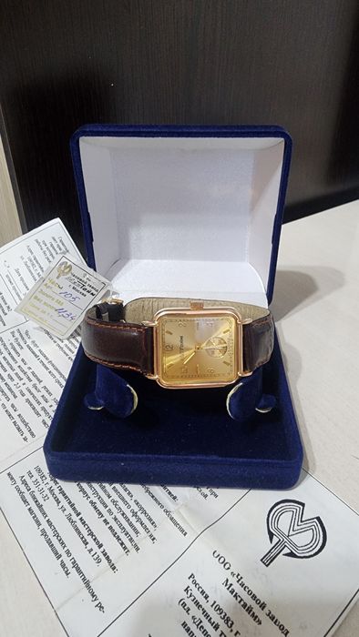 Золотые часы.с паспортом.