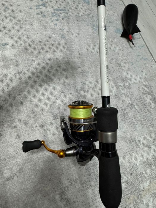 Продам спиннинг white bird с японской катушкой daiwa revros lt2500