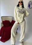 Compleuri dama Chanel