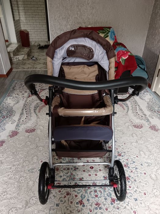 Большая коляска новая
