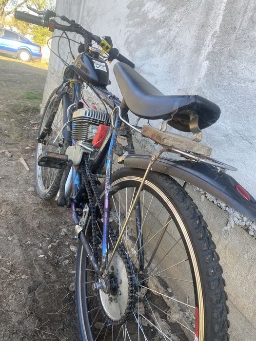 Bicicleta cu motor 100cc