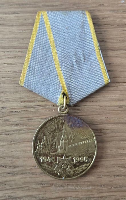 Medalia „50 de ani de la Victoria în Marele Război"
65