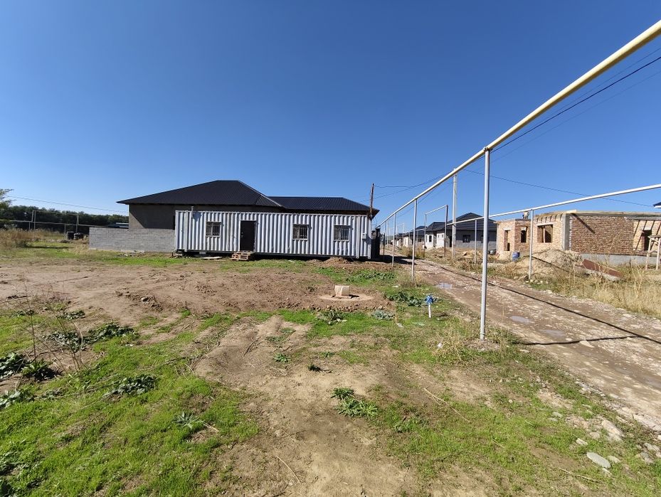 Участок с жилым контейнером 45 тонник