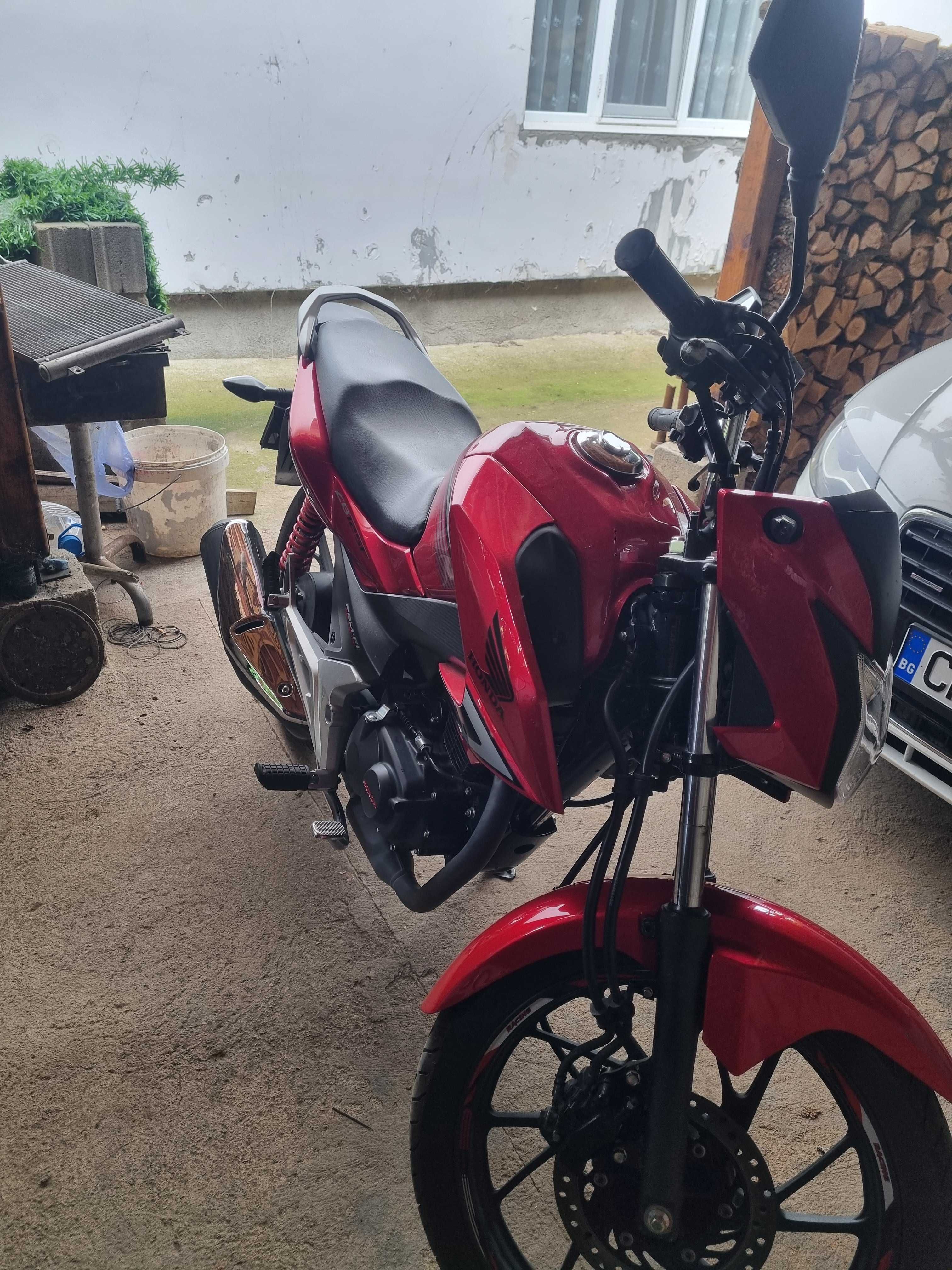 Мотор хонда 125 кубика.