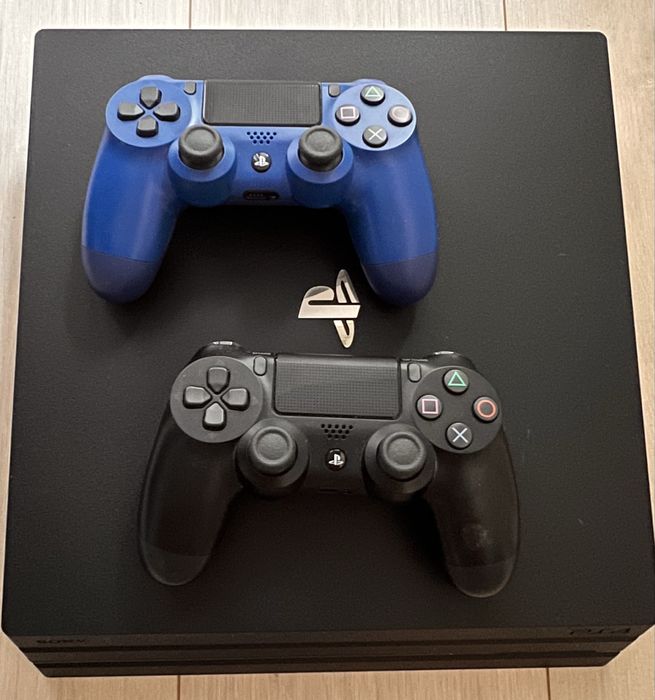 PlayStation 4 Pro 1TB+2 controllere+jocuri+camera-stare excelenta
