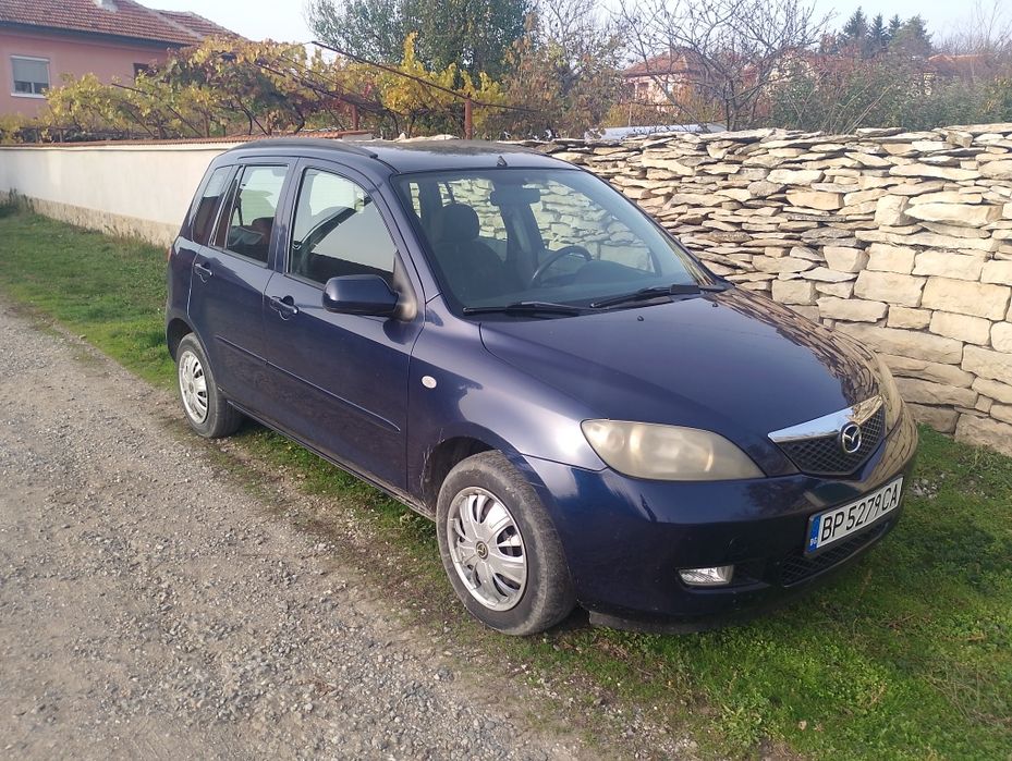 Мазда 2 1.4 бензин/газ