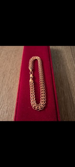Продам новый золотой браслет