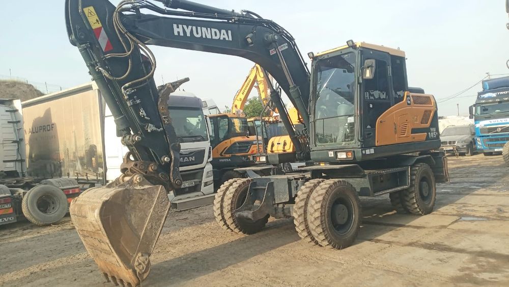 Услуги колесного эксковатора.