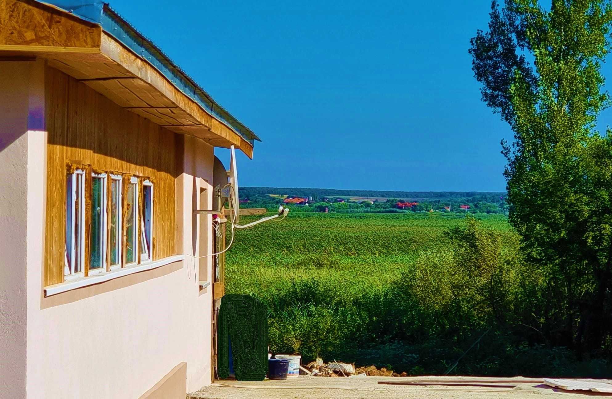 Casa Comana, strada principala, acces spate in balta, helesteu, GAZE