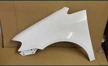 Aripa stanga fata NOUA vopsita alb LB9A VW Touran 2007 - 2011