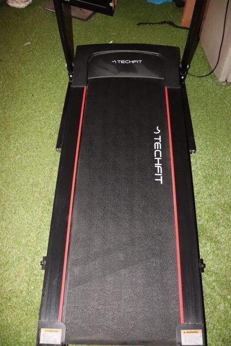 Banda de alergat Tech Fit