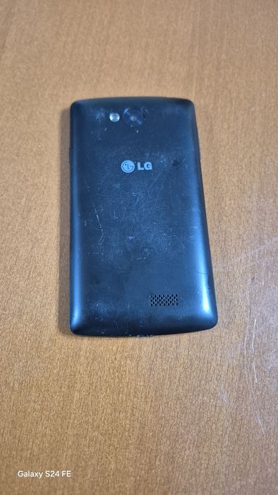 Telefon LG cu folie putin sparta