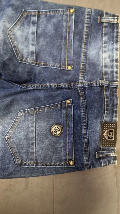 vând blugi albastrii noi