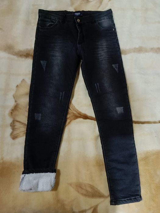 Джинсы с начесом на 10-12 лет.