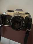 Vand nikon FG , cu obectivul din imagine