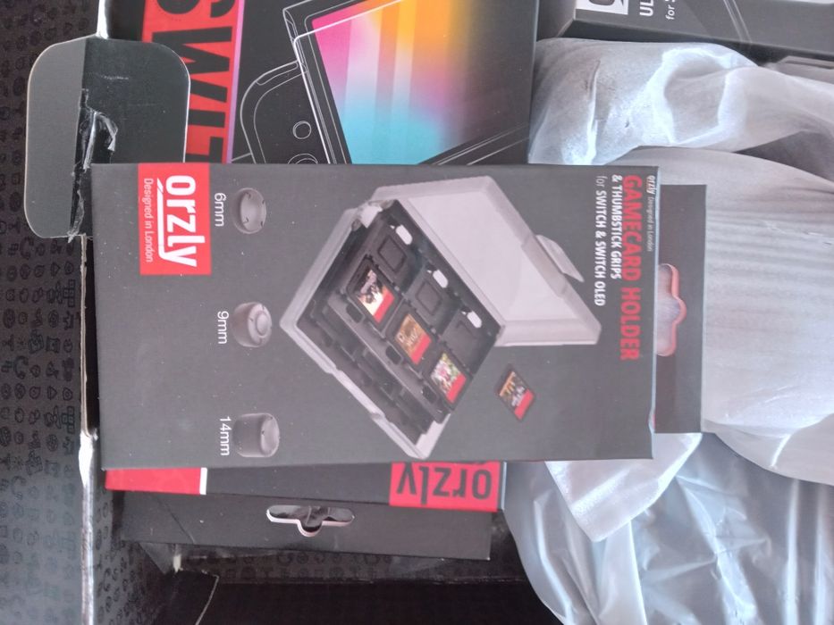 Комплект аксесоари Orzly, съвместим с конзолата Nintendo Switch OLED